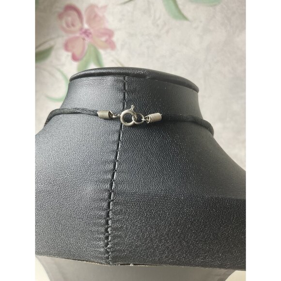 Silver Cross Pendant Necklace With Blue Stone Accents On Black Cord - Picture 5 of 5